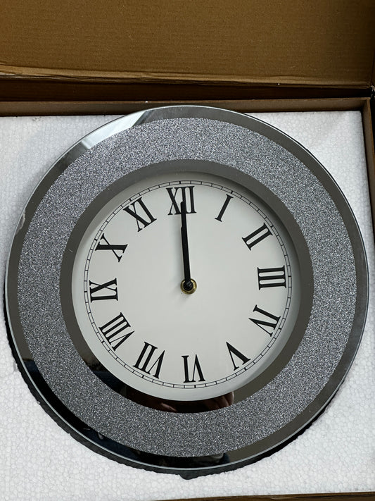 Reloj de pared plateado