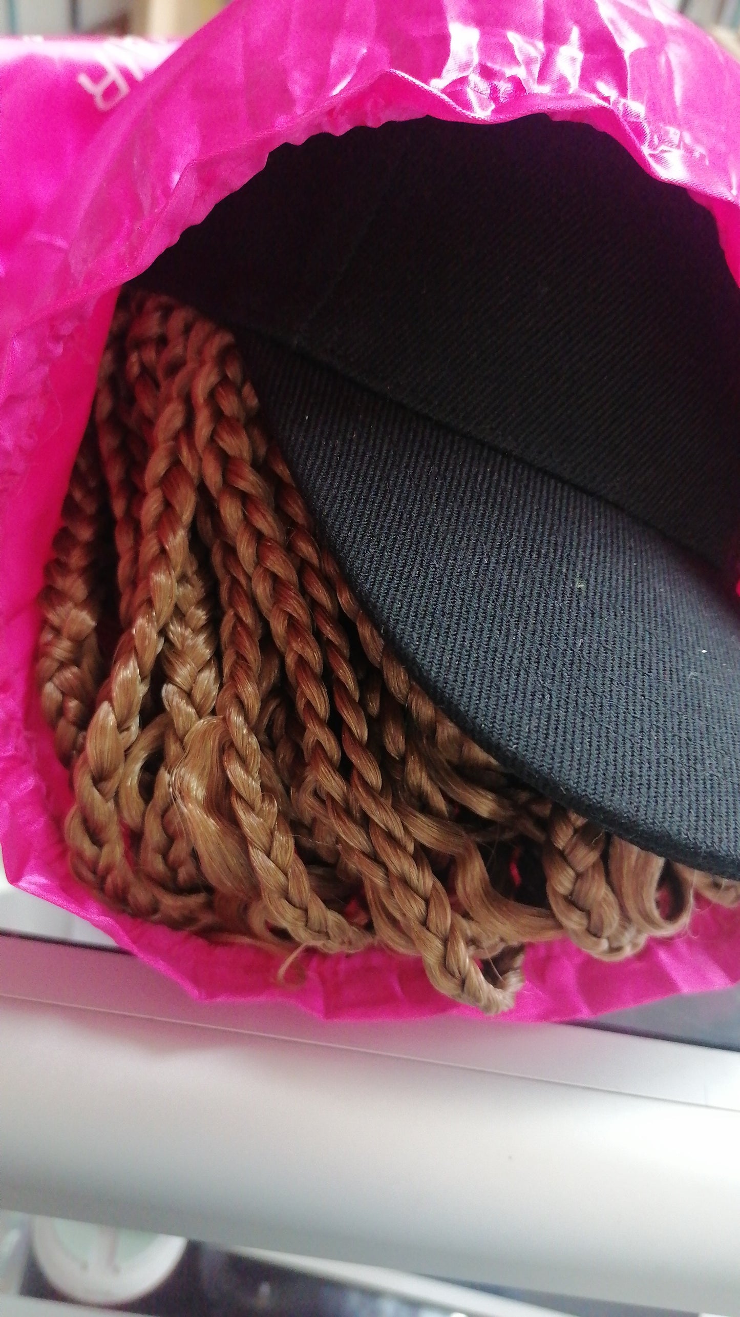 Gorra con peluca